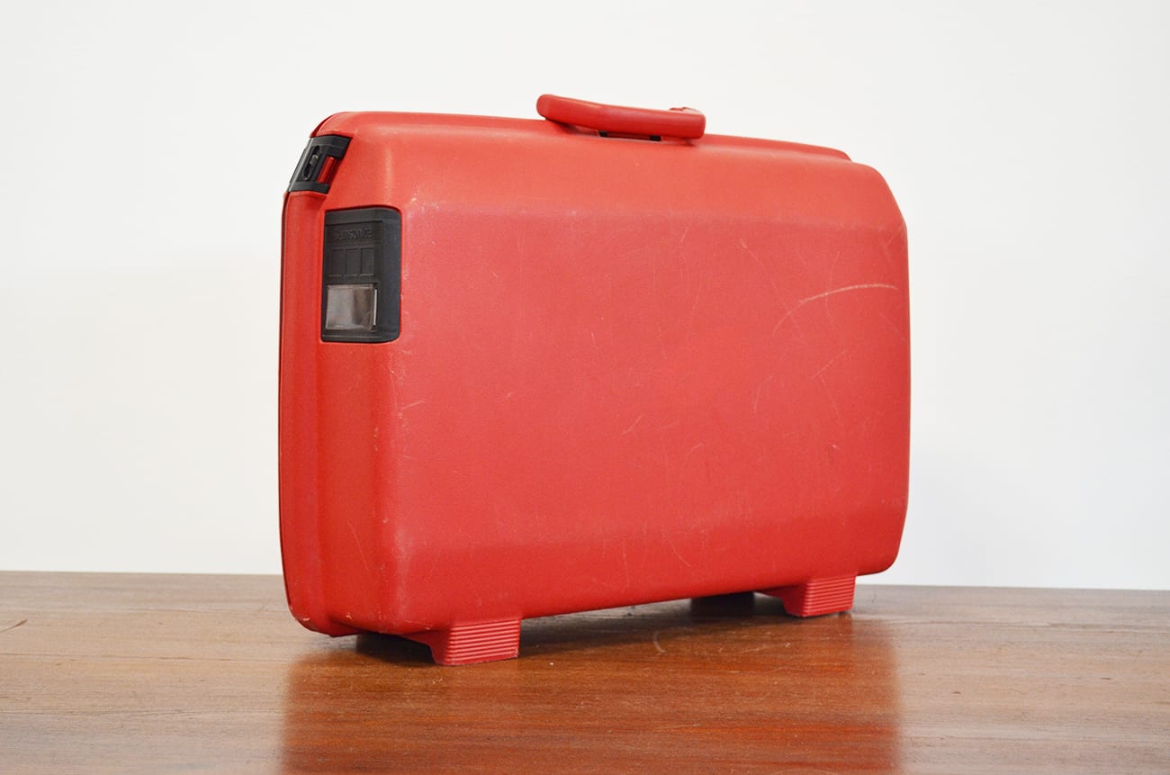 Valigia da viaggio rigida vintage rossa – Samsonite – The House of Vintage